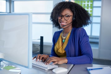 Non profit Credit Counsellor providing support and debt help during a phone appointment